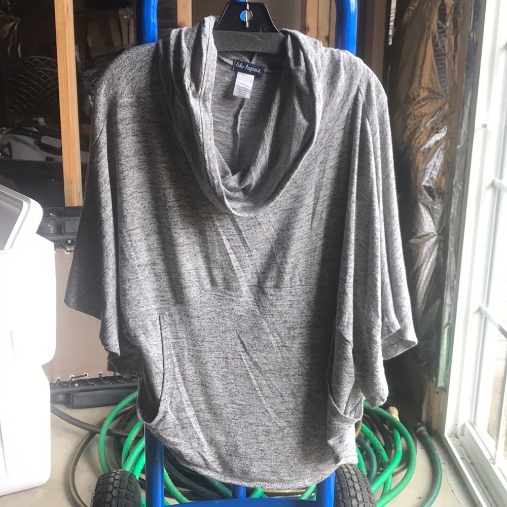 2 pocket grey hooded shirt w/butterfly sleeves.